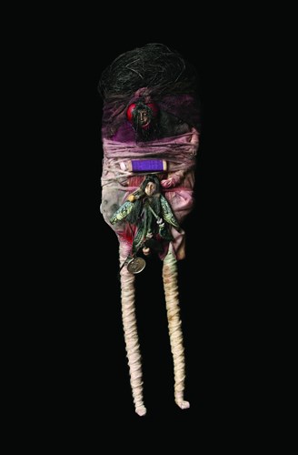 Poupée en mal d'enfantement