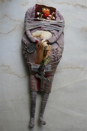 Poupée en mal d'enfantement