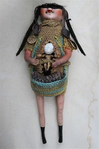 Poupée en mal d'enfantement