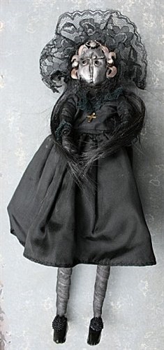 Poupée en mal d'enfantement